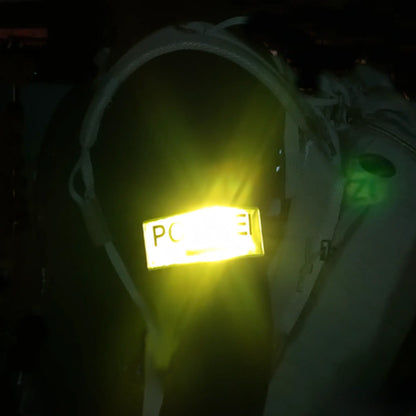 Armbinde neongelb mit Polizei Schriftzug, reflektierend - Nachtansicht